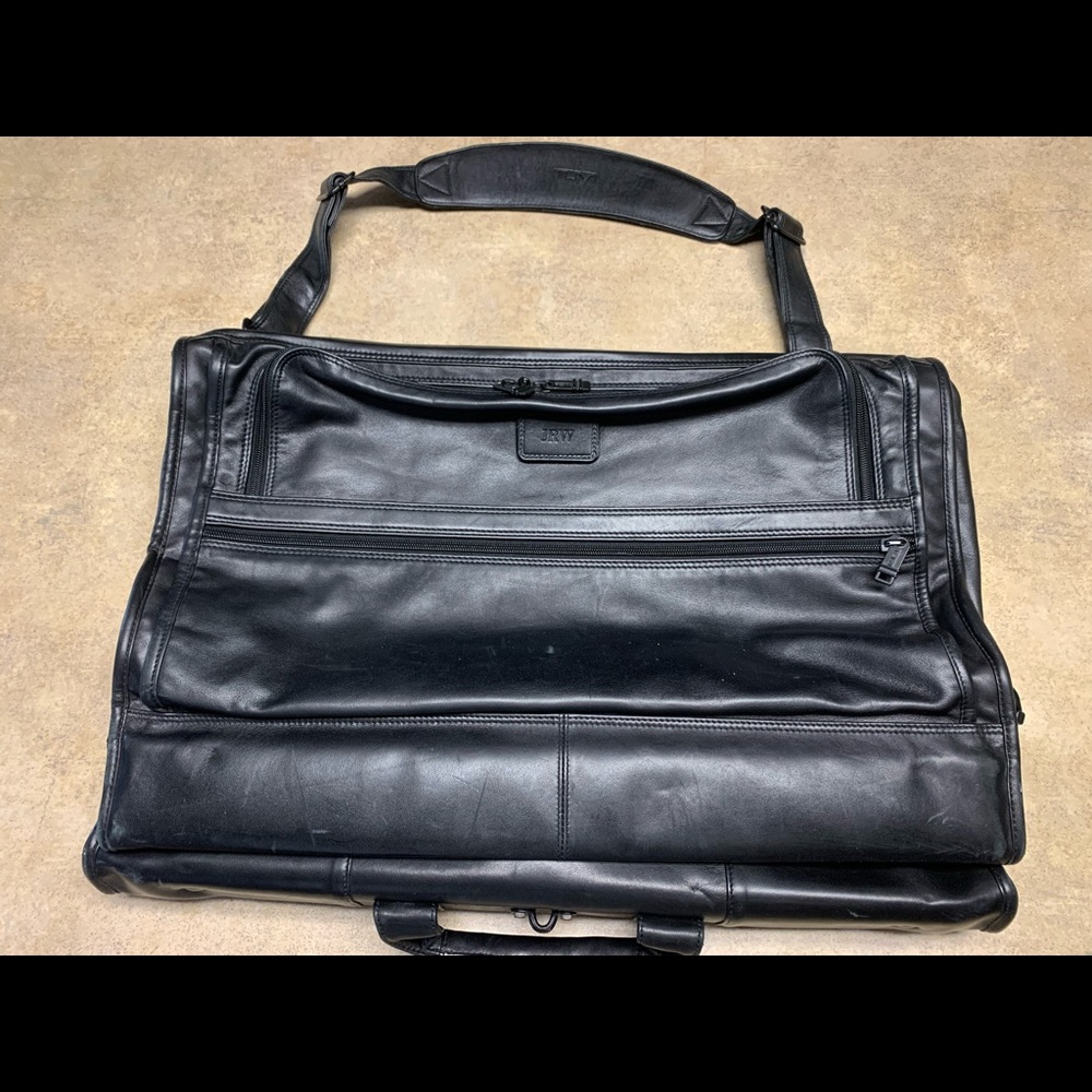 TUMI leather tri-fold suiter garment bag